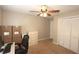 Bedroom featuring neutral walls, a closet with sliding doors, and carpet flooring at 2562 Kennesaw Springs Nw Ct, Kennesaw, GA 30144
