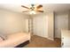 Inviting bedroom with ceiling fan, closet, and natural light for a peaceful retreat at 2562 Kennesaw Springs Nw Ct, Kennesaw, GA 30144