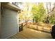 View of the wood deck featuring outdoor seating and a grill at 2562 Kennesaw Springs Nw Ct, Kennesaw, GA 30144