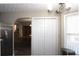 Bright, eat-in kitchen with stainless steel appliances and a glimpse into the dining room at 2562 Kennesaw Springs Nw Ct, Kennesaw, GA 30144