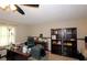 Office space featuring a large desk, bookshelves, and a comfortable office chair at 2562 Kennesaw Springs Nw Ct, Kennesaw, GA 30144