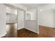 Open dining area with beautiful floors, seamlessly connecting to the living spaces at 2970 Aspen Woods Entry, Atlanta, GA 30360