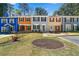Charming townhomes with colorful facades and inviting landscaping at 2970 Aspen Woods Entry, Atlanta, GA 30360