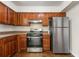 Updated kitchen with stainless steel appliances and generous cabinet space at 2970 Aspen Woods Entry, Atlanta, GA 30360