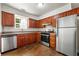 Well-appointed kitchen with stainless steel appliances and ample cabinetry at 2970 Aspen Woods Entry, Atlanta, GA 30360