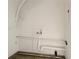 Utility room with white walls, plumbing fixtures and electrical wiring, simple and functional at 2970 Aspen Woods Entry, Atlanta, GA 30360