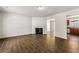 Spacious living room featuring beautiful wood-look tile flooring and a fireplace at 2970 Aspen Woods Entry, Atlanta, GA 30360