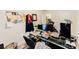 Spacious home office with desk, computer setup and natural light, perfect for remote work or study at 3132 Meadowstone Sw Ln, Atlanta, GA 30331