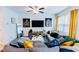 Cozy living room with ample natural light, stylish artwork, and comfortable sectional sofa at 3132 Meadowstone Sw Ln, Atlanta, GA 30331