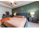 Inviting main bedroom boasts ample space, stylish decor, and ceiling fan, enhancing comfort and appeal at 3132 Meadowstone Sw Ln, Atlanta, GA 30331