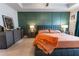 Spacious main bedroom with decorative wall trim, ceiling fan and stylish furnishings at 3132 Meadowstone Sw Ln, Atlanta, GA 30331