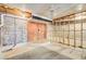 Unfinished basement featuring brickwork and exposed framework, offering a unique design potential at 5162 Charlemagne Sw Way, Lilburn, GA 30047