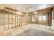 Unfinished basement space with exposed framing and brickwork, ready for renovation and customization at 5162 Charlemagne Sw Way, Lilburn, GA 30047