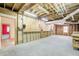 Unfinished basement space with exposed ceiling and framing, ready for customization at 5162 Charlemagne Sw Way, Lilburn, GA 30047