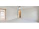 Bright bedroom with neutral carpet with entry to hall and adjoining room at 5162 Charlemagne Sw Way, Lilburn, GA 30047