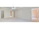 Spacious bedroom with carpeted floors, access to both the bathroom and walk in closet at 5162 Charlemagne Sw Way, Lilburn, GA 30047