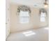 Spacious bedroom features a ceiling fan and bright natural light from windows at 5162 Charlemagne Sw Way, Lilburn, GA 30047