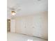 The bedroom features ample storage with multiple closets and neutral carpeting at 5162 Charlemagne Sw Way, Lilburn, GA 30047