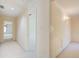 Hallway with classic trim and molding leads to multiple rooms at 5162 Charlemagne Sw Way, Lilburn, GA 30047