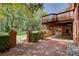 Brick patio, featuring an outdoor staircase, perfect for entertaining guests at 5162 Charlemagne Sw Way, Lilburn, GA 30047