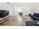 Open-concept living room with durable flooring and modern furnishings at 89 De Arc Nw Pl, Atlanta, GA 30327