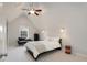Charming bedroom featuring a ceiling fan, vaulted ceilings, window, and cozy decor for a relaxing ambiance at 1814 Dupont Nw Ave, Atlanta, GA 30318