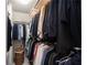 Walk-in closet featuring ample hanging space, shelving and a place for a laundry basket for optimal organization at 1814 Dupont Nw Ave, Atlanta, GA 30318