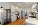 Bright, open kitchen with white cabinets, modern appliances, and wood floors, perfect for cooking at 1814 Dupont Nw Ave, Atlanta, GA 30318