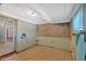 Image of the basement area with unfinished walls, tile floors and a small window at 638 Bryan Se St, Atlanta, GA 30312