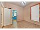 A compact bathroom features a modern light fixture and tile flooring at 638 Bryan Se St, Atlanta, GA 30312