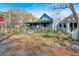 Charming home partially surrounded by a chain link fence, situated near an intersection at 638 Bryan Se St, Atlanta, GA 30312