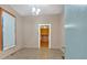 A brightly lit living room boasts tile floors and an adjacent open room at 638 Bryan Se St, Atlanta, GA 30312