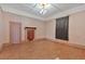 An empty living room features hardwood floors and a decorative ceiling light fixture at 638 Bryan Se St, Atlanta, GA 30312