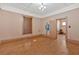 A sparsely decorated living room with hardwood floors and plain walls awaits personalization at 638 Bryan Se St, Atlanta, GA 30312
