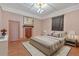 Serene bedroom with wood floors, decorative fireplace and ample natural light at 638 Bryan Se St, Atlanta, GA 30312