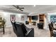 Finished basement with a theatre area, including a wall-mounted TV, and bar with wine storage at 2314 Edgemere Lake Cir, Marietta, GA 30062