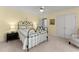Bedroom featuring a ceiling fan, neutral walls, carpet, and ensuite bathroom at 2314 Edgemere Lake Cir, Marietta, GA 30062