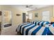 Bedroom featuring twin beds, a ceiling fan, and ensuite bathroom at 2314 Edgemere Lake Cir, Marietta, GA 30062