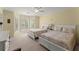Bedroom with two beds, neutral tones, and bright natural light, creating a comfortable and inviting space at 2314 Edgemere Lake Cir, Marietta, GA 30062