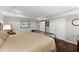 Cozy bedroom with carpet floors, neutral walls, and a double door closet at 2314 Edgemere Lake Cir, Marietta, GA 30062