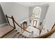 Grand foyer with a staircase, ornate chandelier, and a decorative window creating an impressive entrance at 2314 Edgemere Lake Cir, Marietta, GA 30062