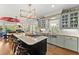 Bright open kitchen with central island, stainless steel appliances, breakfast area, and plenty of natural light at 2314 Edgemere Lake Cir, Marietta, GA 30062