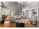 Spacious living room with high ceilings, hardwood floors, and abundant natural light at 2314 Edgemere Lake Cir, Marietta, GA 30062