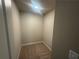 This walk-in closet has neutral paint and new carpet at 315 Lakeside Ct, Canton, GA 30114