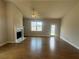 Spacious living room boasting a fireplace, hardwood flooring, and bright natural light at 315 Lakeside Ct, Canton, GA 30114