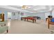 Large basement featuring a billiards area, seating, and access to the bathroom at 315 Monroe Dr, Mcdonough, GA 30252
