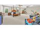 Large bedroom with a sitting area, ceiling fans and lots of natural light at 315 Monroe Dr, Mcdonough, GA 30252
