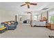 A generously sized bedroom includes a four-poster bed, a comfortable seating area, and plenty of space for activities at 315 Monroe Dr, Mcdonough, GA 30252