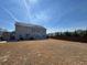 Large backyard with a shed in the corner at 5530 Lacebark Pine Ct, Cumming, GA 30040