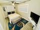 Cozy bedroom with a plush bed, stylish decor, and a serene ambiance for restful nights at 8562 Lake Dr, Snellville, GA 30039